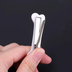 White Bone Hair Clip Cute Cartoon Bobby Pin Y2k Fashion Hair Volume Clip Small Hairpin close-up view