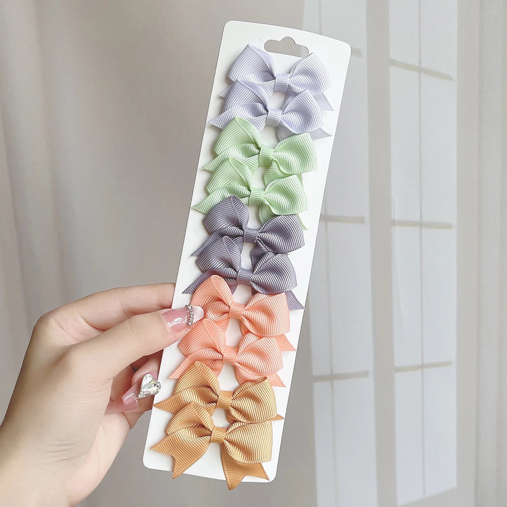 10Pcs/Set Solid Color Kids Bows Hair Clips for Baby Girls Handmade Ribbon Bowknot Hai lifestyle view