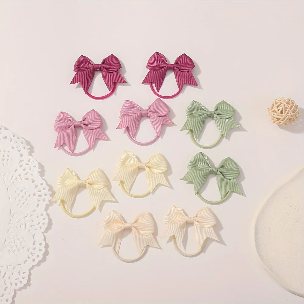 10Pcs/lot Grosgrain Ribbon Pigtail Hair Bows Elastic Hair Ties Hair Bands Holders Girl close-up view