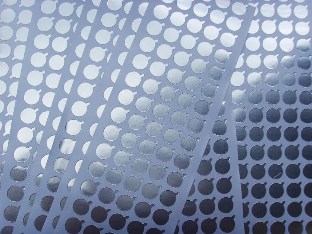 Universal Metallic Silver Aluminum Foil Seal Stickers | Tamper-Proof Bottle Seals close-up view
