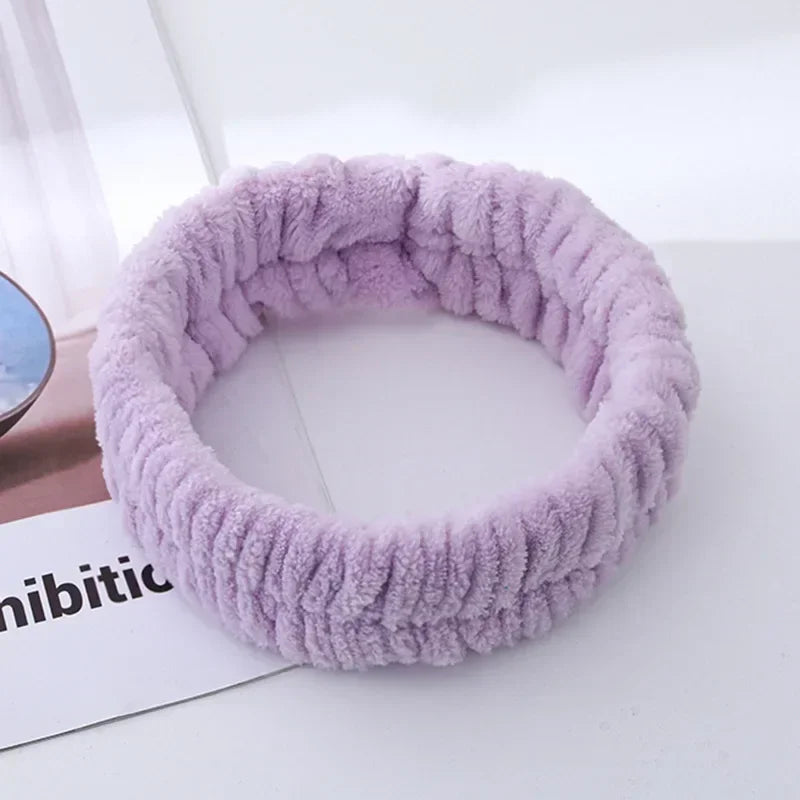 Soft Coral Fleece Headband Women Makeup Wash Face Spa Elastic Hair Band Fashion Female close-up view