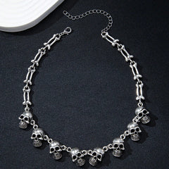Gothic Skull Choker Necklace | Multiple Skull Connected Gothic Jewelry for Women close-up view