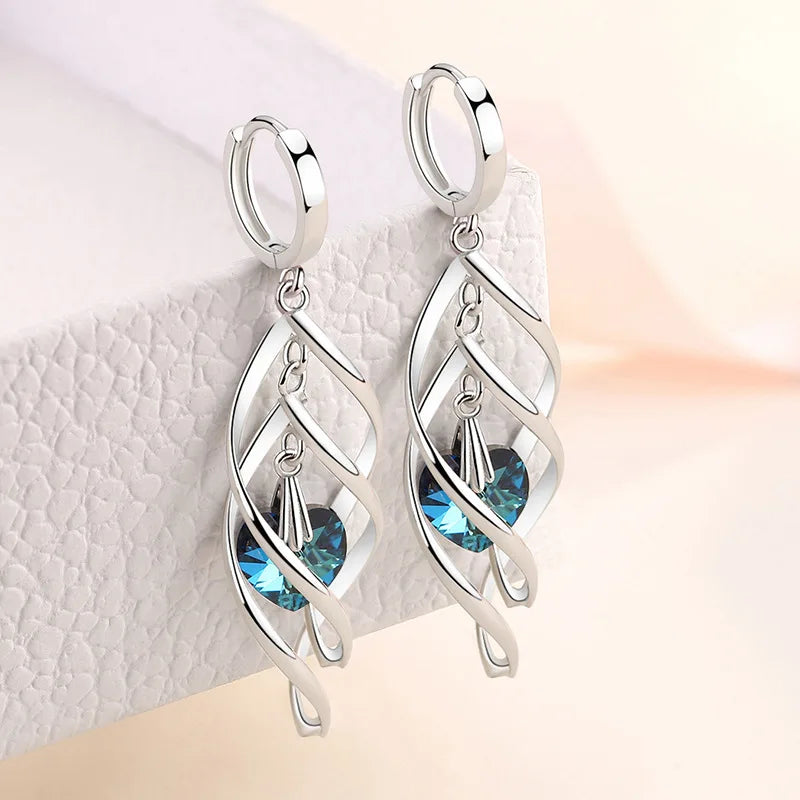 925 Silver Blue Crystal Drop Earrings | Hollow Long Dangle Earrings for Women close-up view