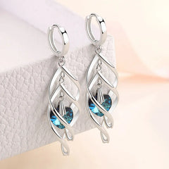 925 Silver Blue Crystal Drop Earrings | Hollow Long Dangle Earrings for Women close-up view