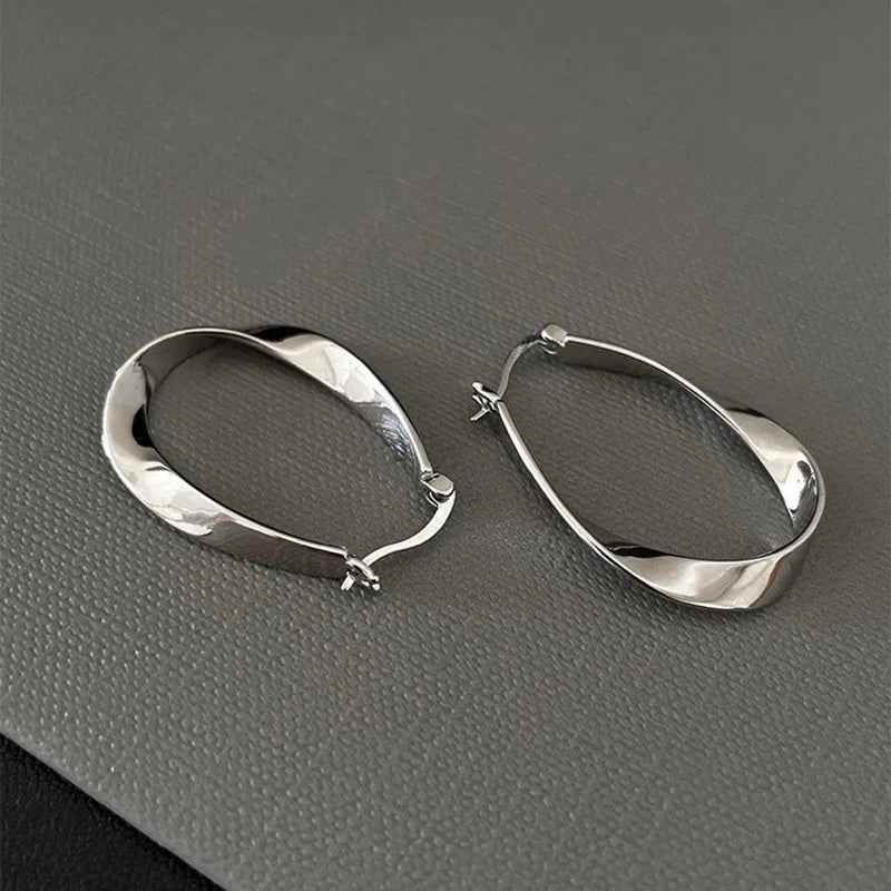 Geometric Twisted Hoop Earrings | Niche Design Statement Jewelry for Women detail view