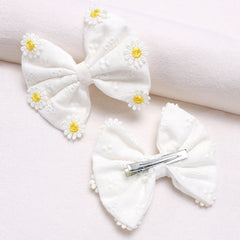 2 PC Daisy Hair Clips Girls White Bow Hair Clips Simple Flower Hair Accessories Hair C close-up view