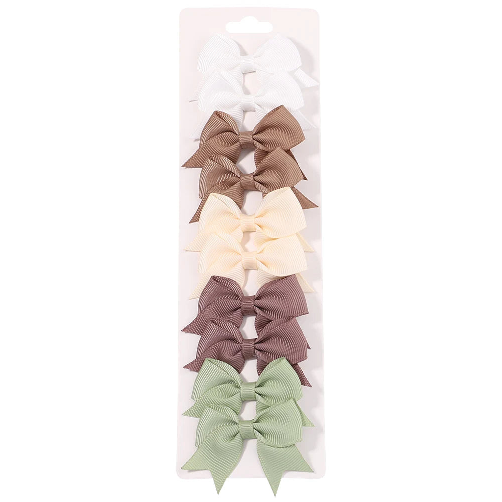 10Pcs/Set New Cute Solid Ribbon Bowknot Hair Clips for Baby Girls Handmade Bows Hairpi close-up view