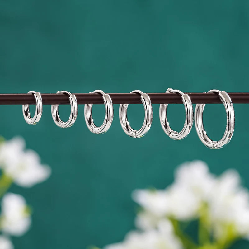 Huitan Glossy Minimalist Hoop Earrings Chic 6mm/7mm/8mm/9mm/10mm/12mm Ear Piercing Ac lifestyle view