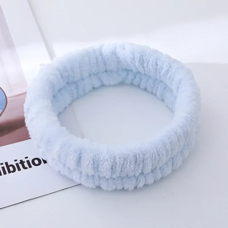 Soft Coral Fleece Headband Women Makeup Wash Face Spa Elastic Hair Band Fashion Female close-up view