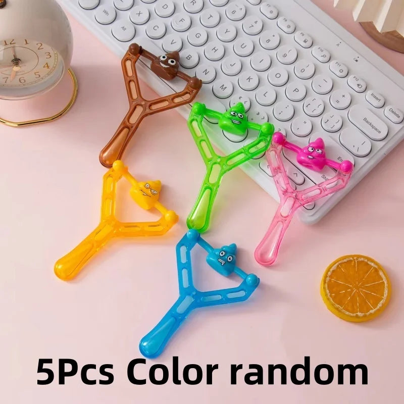1-5PCS Funny Shooting Slingshot Prank Fake Poop Poo Game Antistress Children's Day Dec close-up view