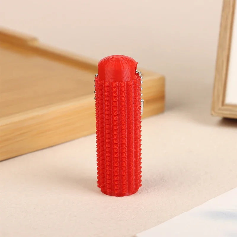 Little Ouchies Pocket-Sized Mini Spiky Grippie Stress Relief Keychain Fidget Toy | Anx close-up view