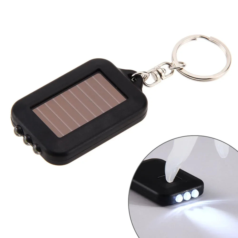 Portable LED Keychain Solar Flashlight | Mini Pocket Light for Outdoor Hiking close-up view
