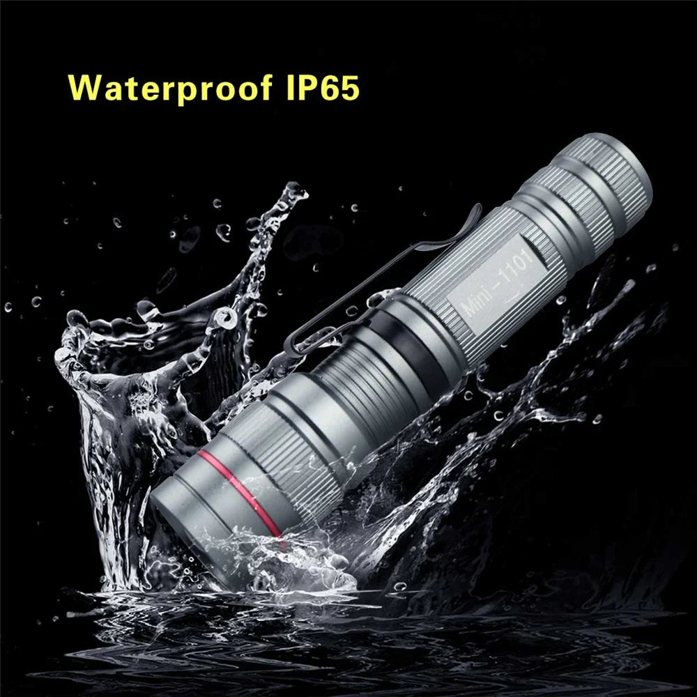 Mini LED Flashlight Q5 | Portable Torch with 3 Modes, Waterproof, AA Battery Powered close-up view