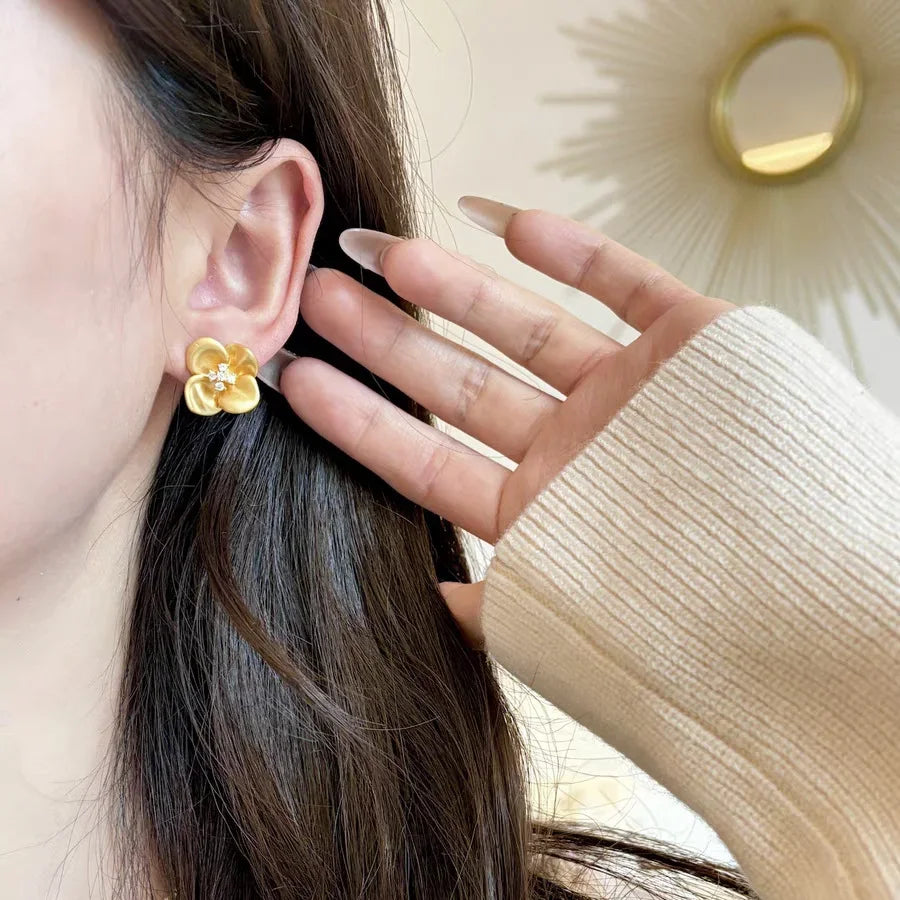 LUXUKISSKIDS Fairy Flower Earrings Stud | Gold-Plated Stainless Steel Piercing Jewelr lifestyle view
