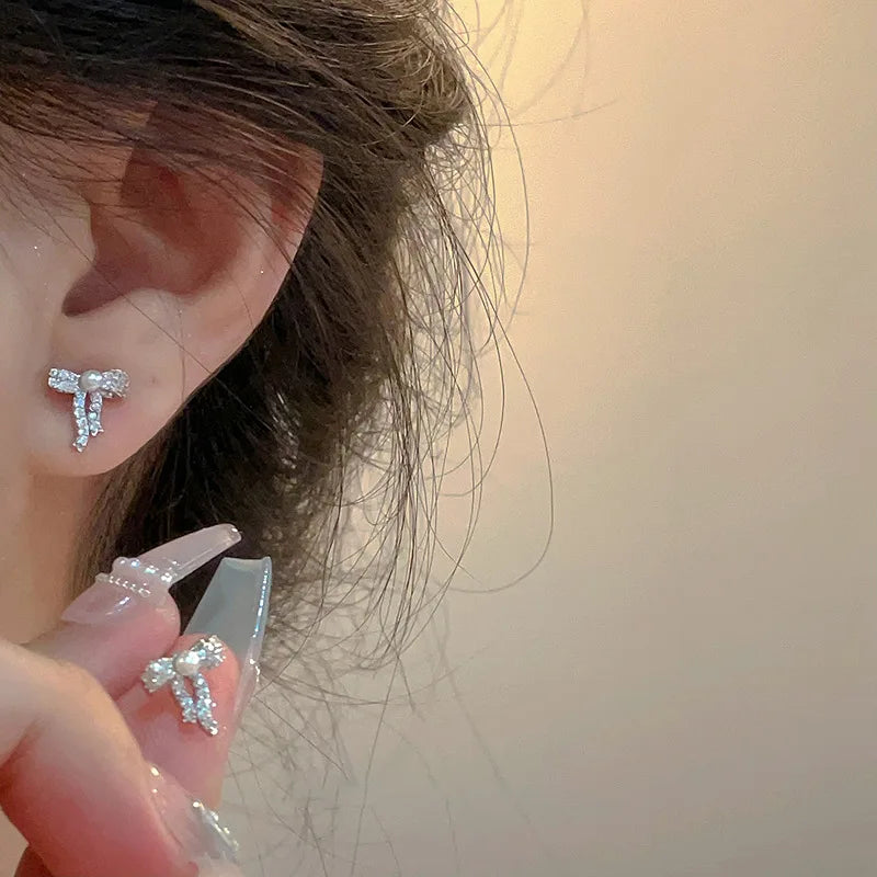 PANJBJ 925 Sterling Silver Bow Knot Earring for Women Texture Tassels Sweet Romantic lifestyle view