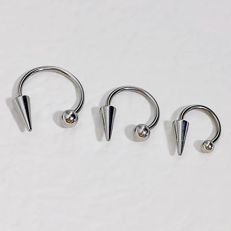 16G Stainless Steel Cone Septum Ring Horseshoe Nose Piercing Spike Lip Tragus Helix Ea close-up view