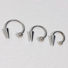 16G Stainless Steel Cone Septum Ring Horseshoe Nose Piercing Spike Lip Tragus Helix Ea close-up view