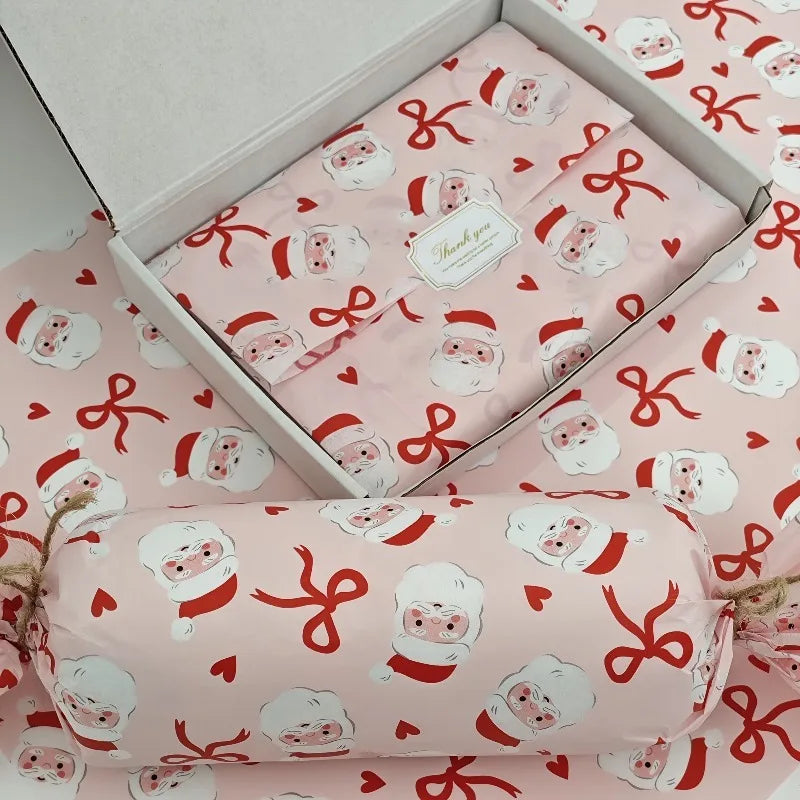 Pink Santa Claus Bow Heart Pattern Wrapping Paper | Christmas Gift Wrap for Fragile I lifestyle view