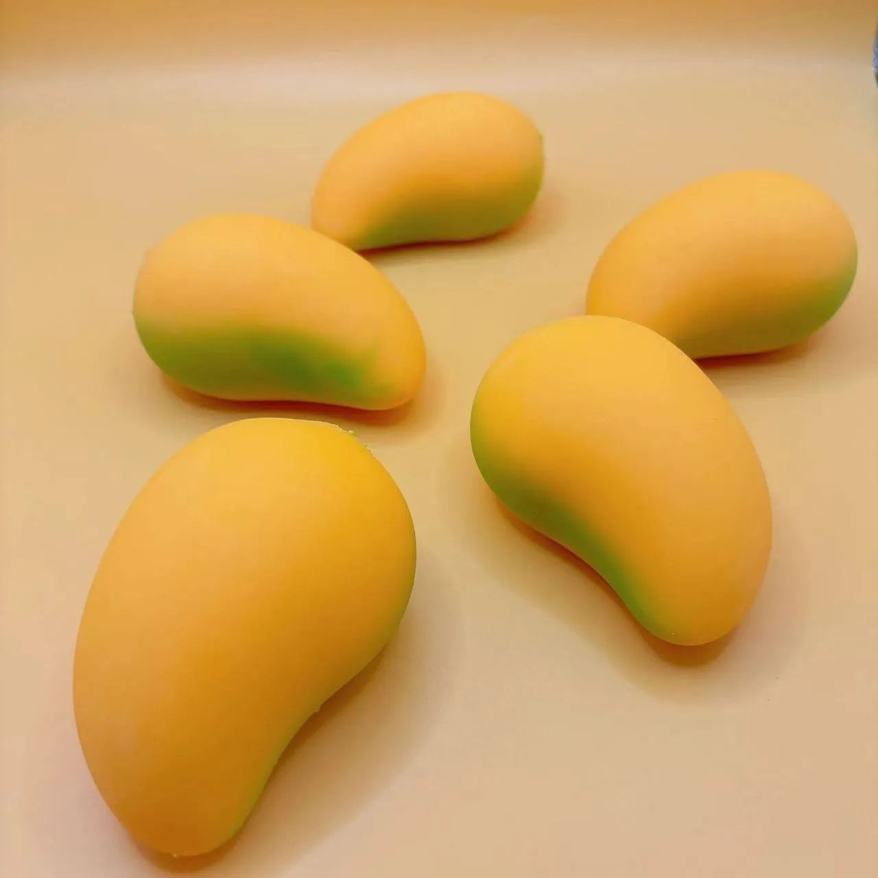 Stress Relief Toy Mango Squishy Ball | Super Slow Rebound Fidget Toy for Anxiety lifestyle view