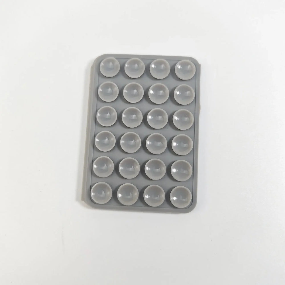 Double Sided Silicone Suction Pad Mobile Phone Holder Hands Free Accessory for Videos close-up view
