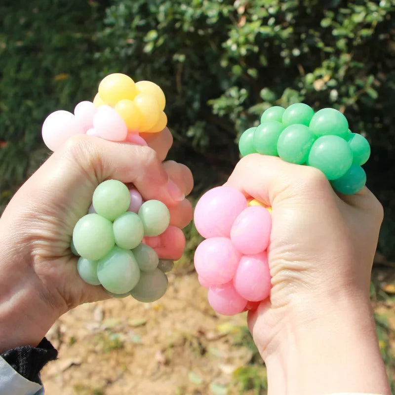 6CM Hand Squeezed Tri Color Flour Grape Tennis Ball Decompression Toy TPR Sticky Slow close-up view