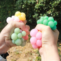 6CM Hand Squeezed Tri Color Flour Grape Tennis Ball Decompression Toy TPR Sticky Slow close-up view