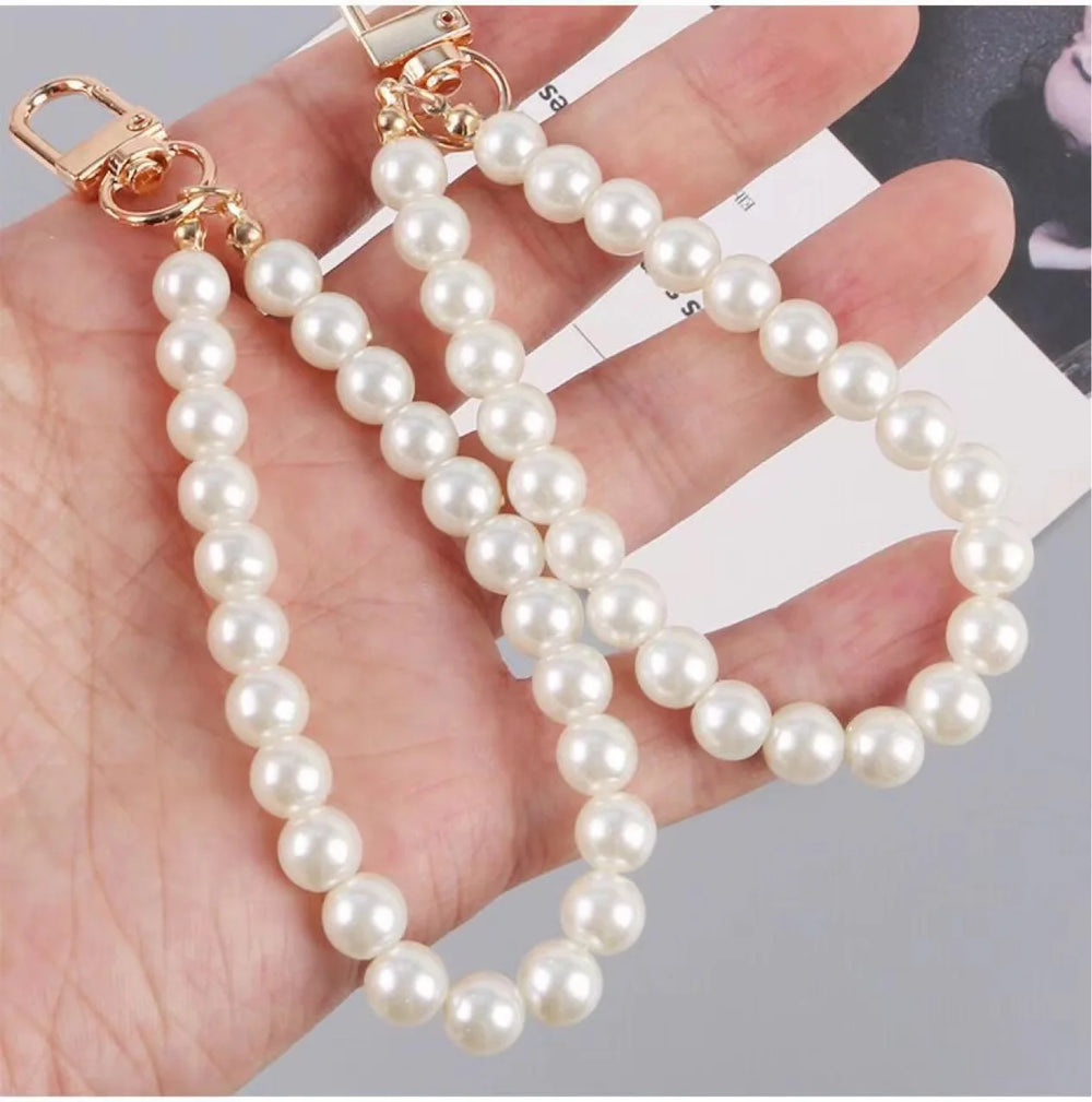 ZAKOL Cute Pearl Keychain for Women Girls Shiny Pearl Bead Shell Phone Bag Backpack C lifestyle view