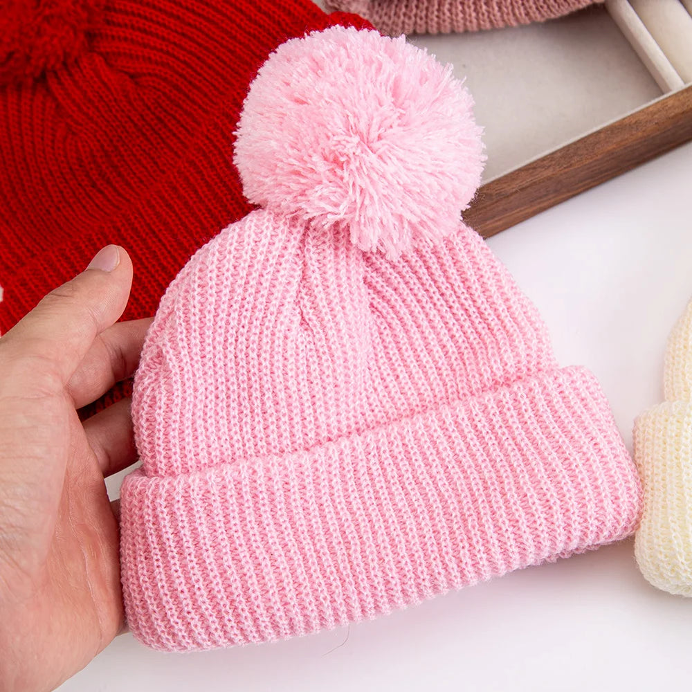 Solid Pom Knitted Baby Beanie | Newborn Infant Winter Hat close-up view