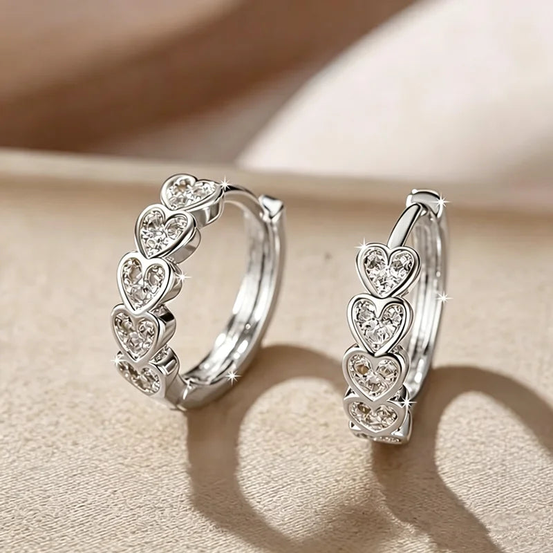 Luxury Golden Heart Earrings Small Exquisite Elegant Clip-On Earrings For Women Tragus close-up view