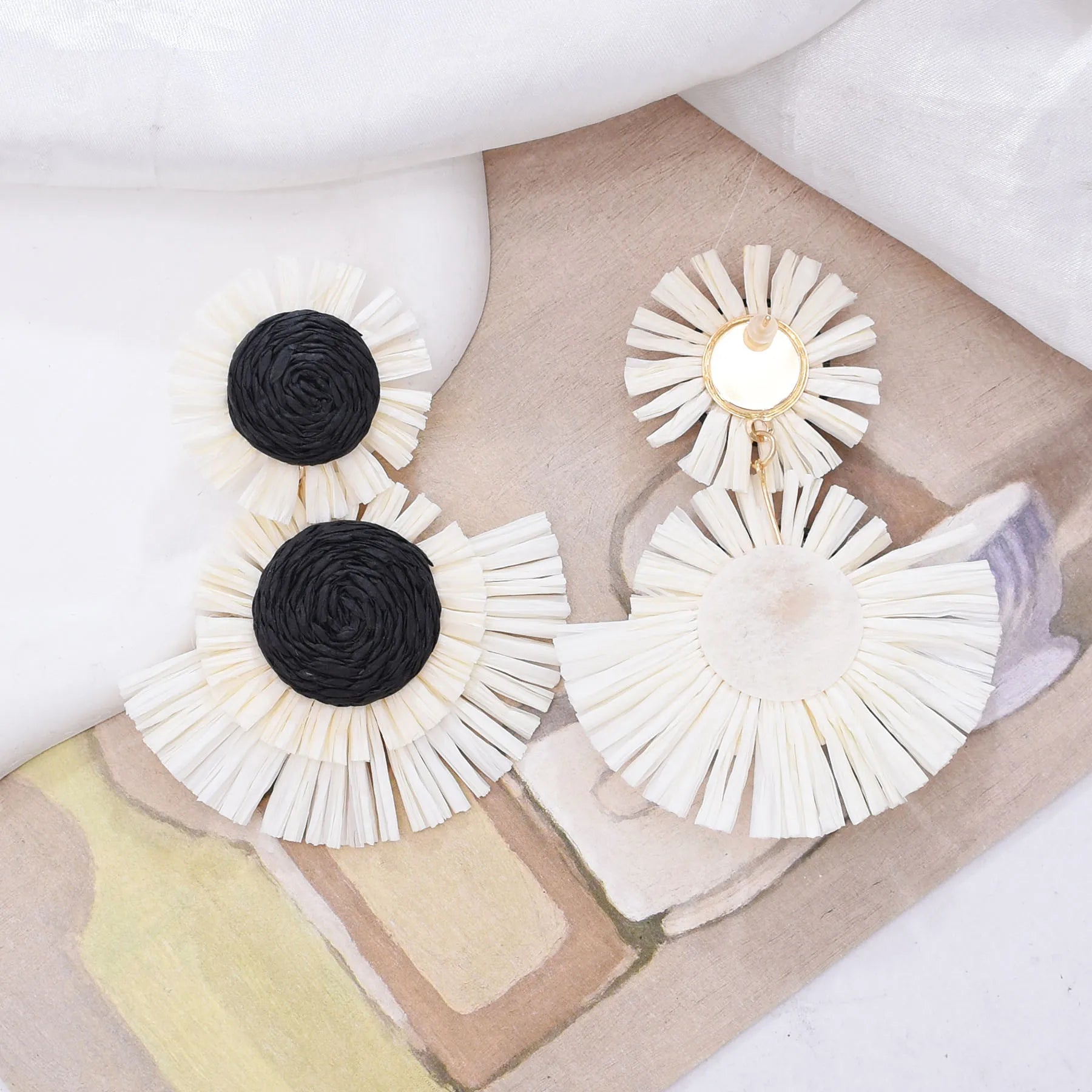 Black And White Raffia Fan Dangle Earrings | Bohemian Tribal Handmade Jewelry lifestyle view