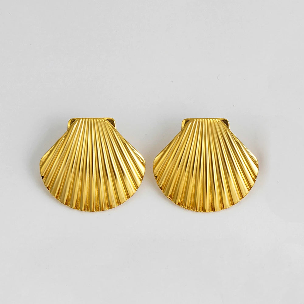 Vintage Gold Snail Shell Drop Earrings | CZ Zircon Beach Jewelry for Women close-up view