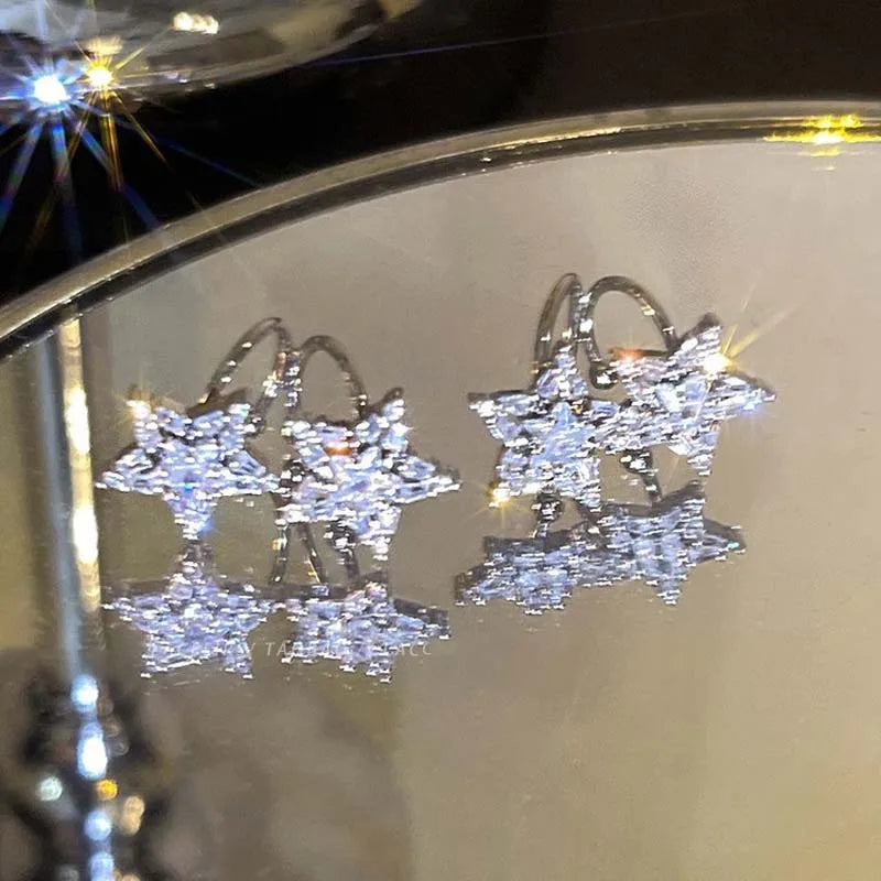 Shining Double Star Ear Clip for Women Fashion Double Layered Zircon Pentagram No Pier close-up view