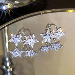 Shining Double Star Ear Clip for Women Fashion Double Layered Zircon Pentagram No Pier close-up view