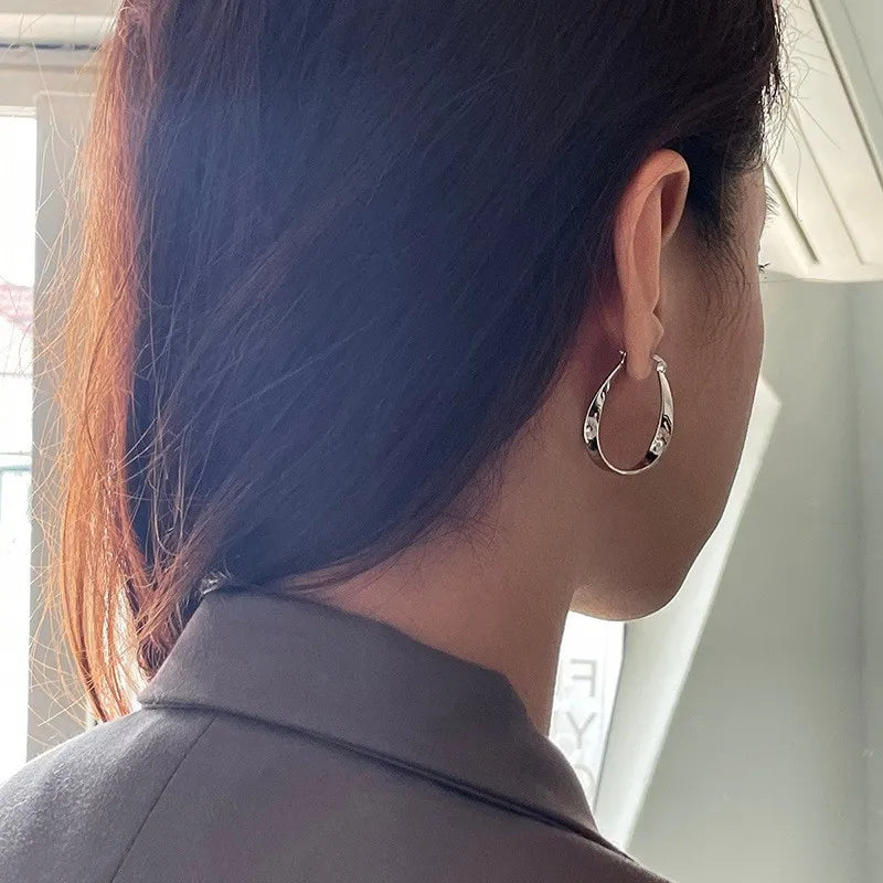 Geometric Twisted Hoop Earrings | Niche Design Statement Jewelry for Women lifestyle view