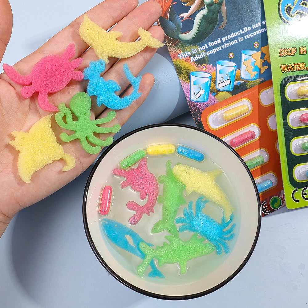 3Pcs Creative Soaking Water Expands To Large Sponge Capsule Toys Dinosaur Sea Animal lifestyle view
