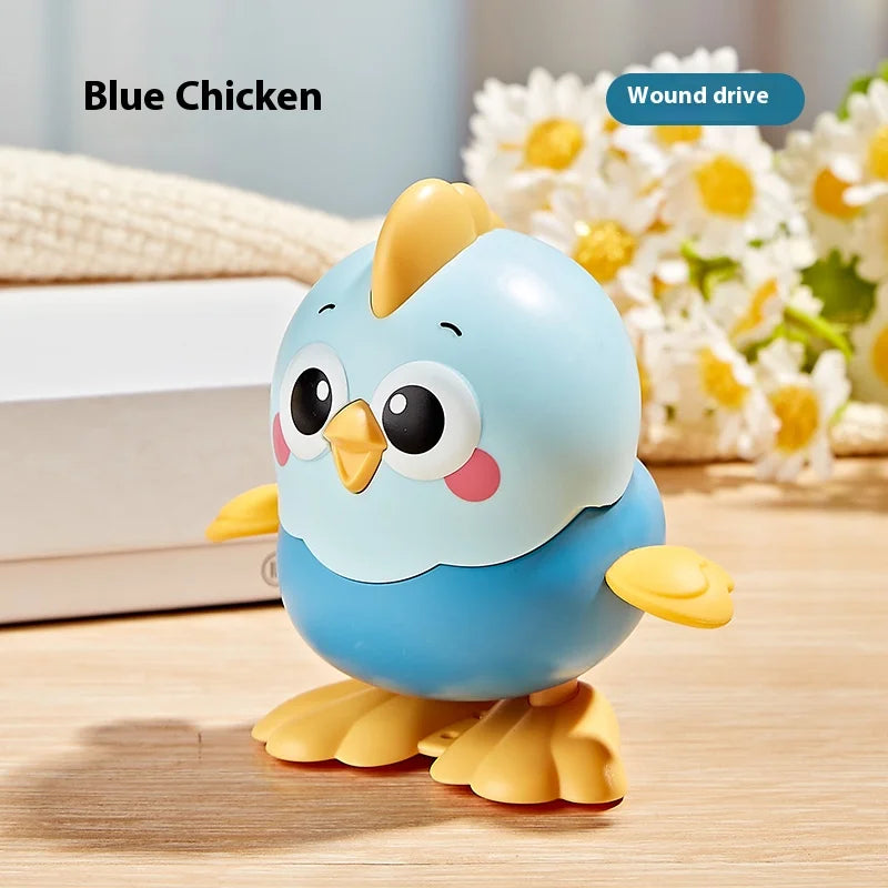 Cartoon Clockwork Chick Toy On Chain Chick Move Jump Little Chicken Baby Move Crawl To close-up view