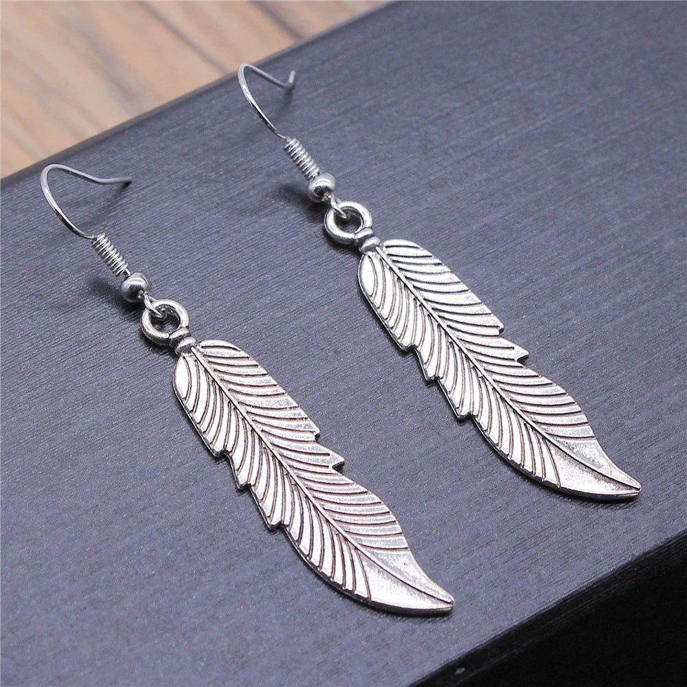 Vintage Feather Dangle Earrings | Boho Drop Earrings for Women close-up view