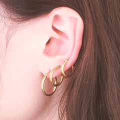 LUXUSTEEL Golden Stainless Steel Hoop Earrings | Big and Small Circle Ear Jewelry for close-up view