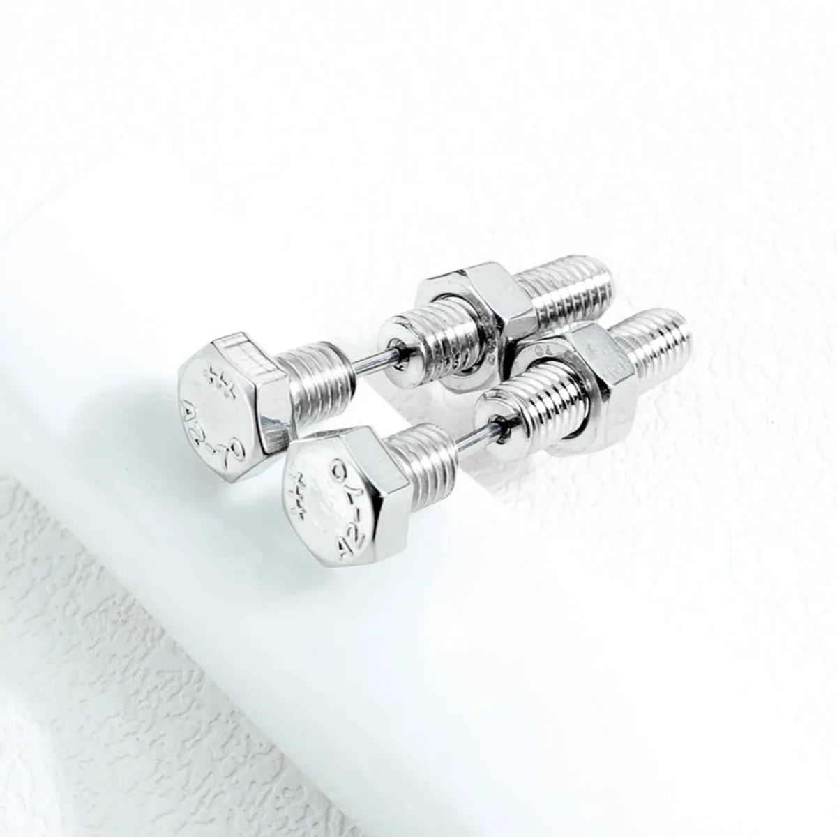 2Pcs Unisex Gothic Punk Rock Stainless Steel Nail Screw Piercing Stud Earrings Novelt lifestyle view