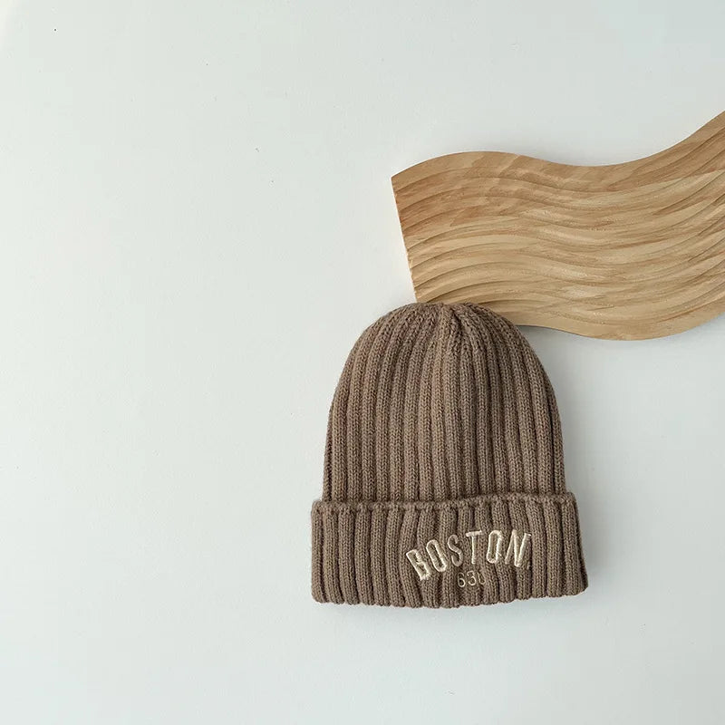 Boston Knitted Baby Hat with Letter Design | Winter Ear Protection Cap close-up view