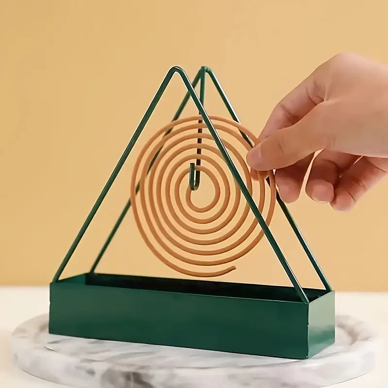 Triangle Mosquito Mat Stand | Simple Iron Holder for Indoor Rooms close-up view