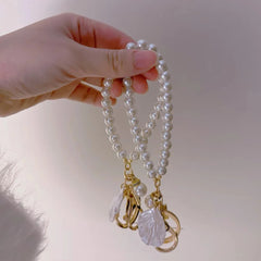ZAKOL Cute Pearl Keychain for Women Girls Shiny Pearl Bead Shell Phone Bag Backpack Char detail view