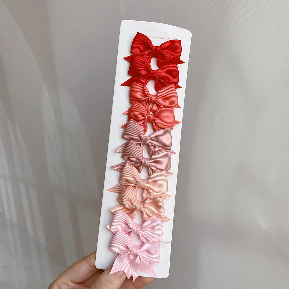 10Pcs/Set Solid Color Kids Bows Hair Clips for Baby Girls Handmade Ribbon Bowknot Hair close-up view