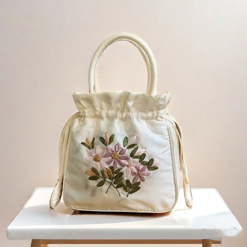Small Embroidered Flower Bucket Bag | Women's Top Handle Drawstring Purse close-up view