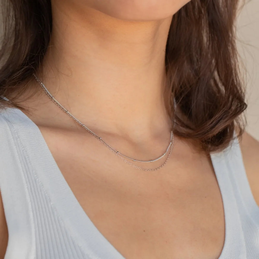 Dainty Gold Layered Bead Chain Necklace | Stainless Steel Star Pendant Jewelry lifestyle view