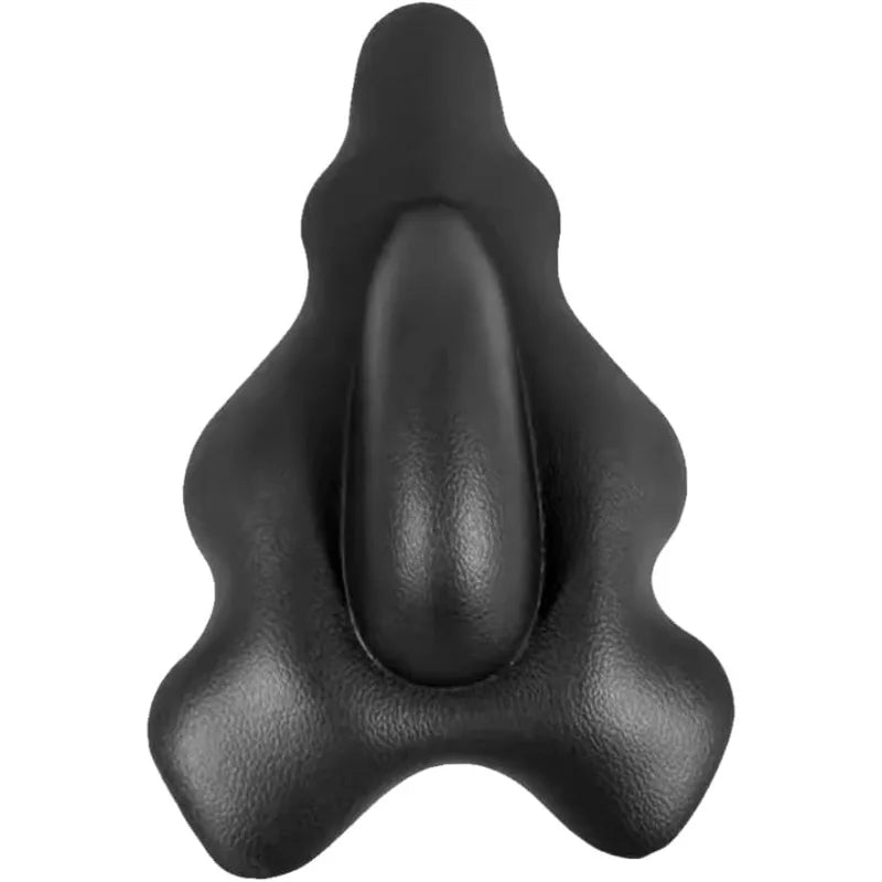 Black rubber duck shaped like a nose on a white background