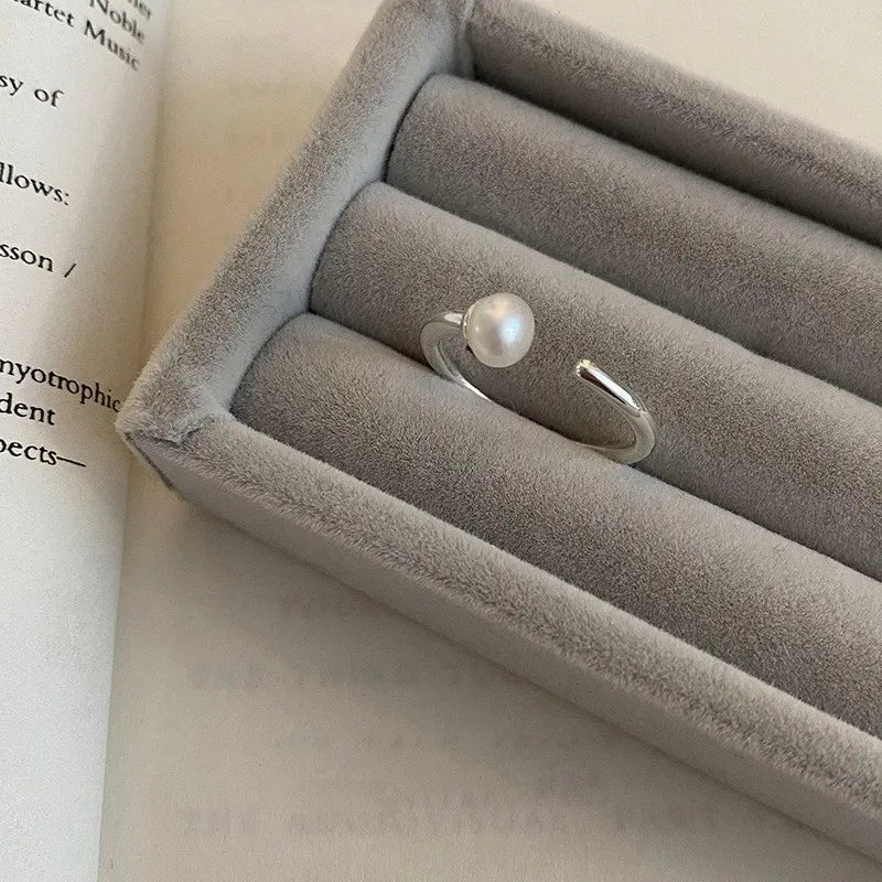 PANJBJ 925 Sterling Silver Pearl Irregular Ring for Women Shell Overlapping Hollow Swe close-up view