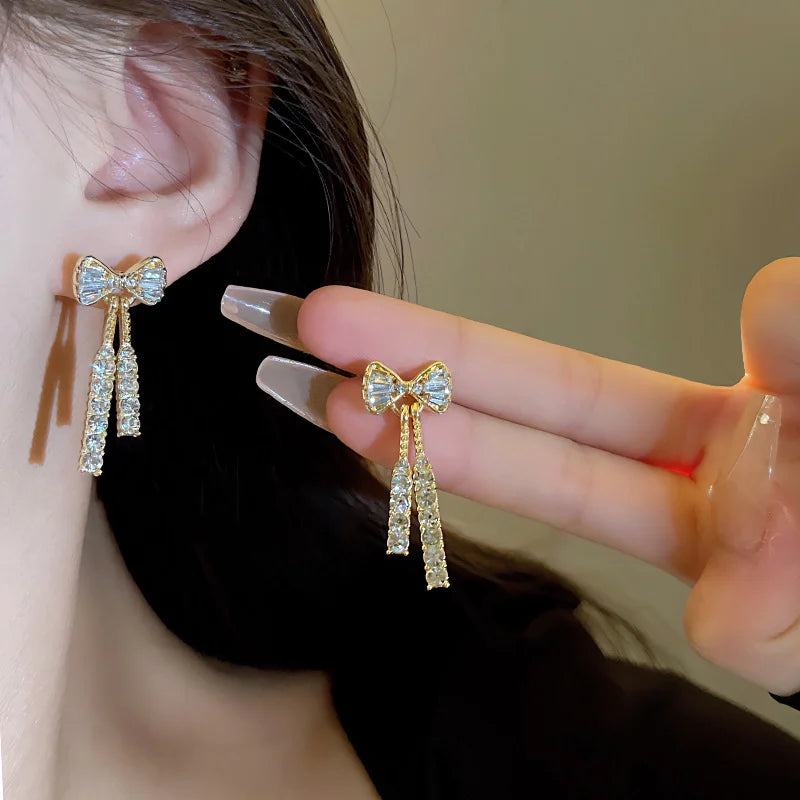 Gold Color Shiny Bow Stud Earrings For Women Fashion Exquisite Dainty Rhinestone Bow lifestyle view