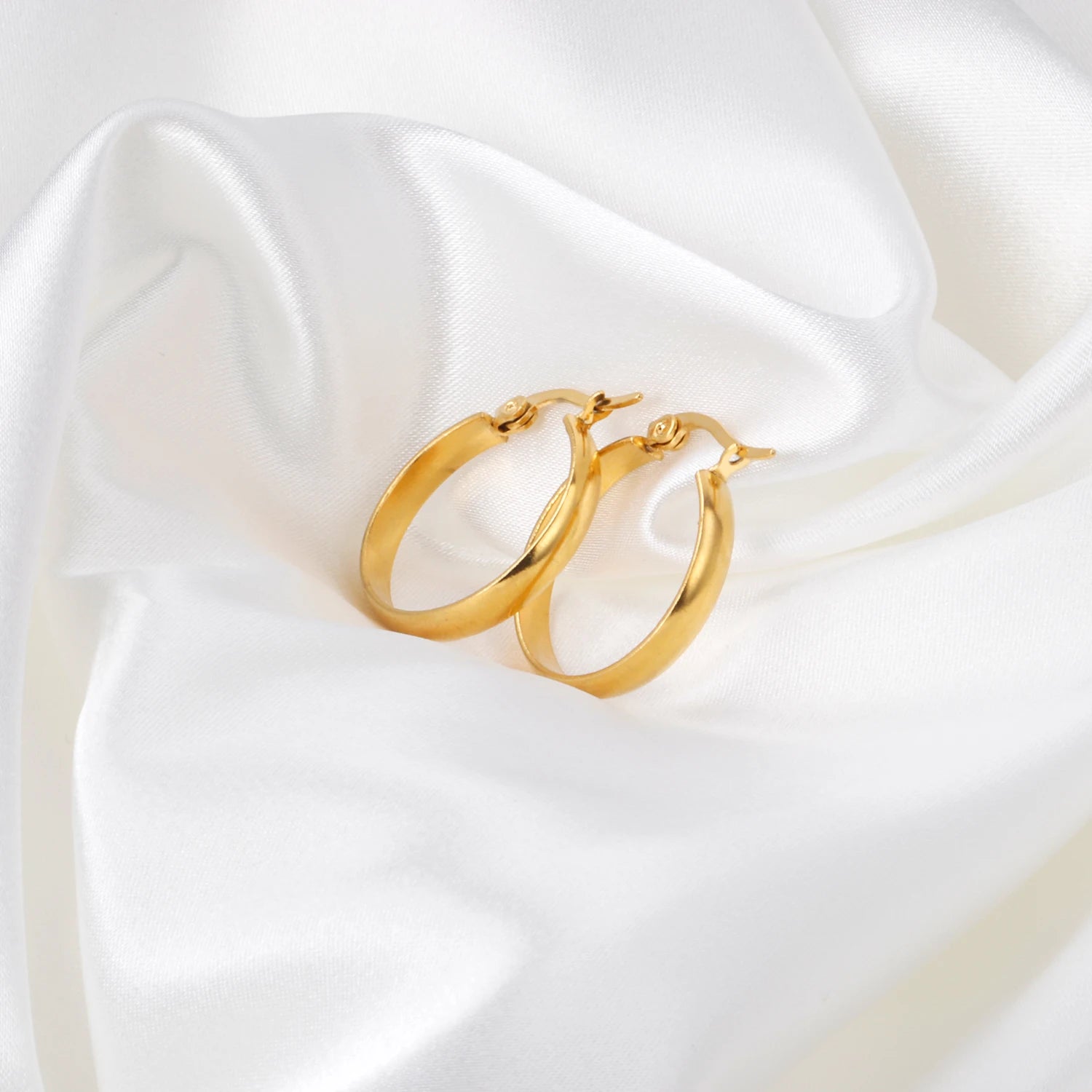 LUXUSTEEL Stainless Steel Hoop Earrings | Simple Geometric Shapes for Women lifestyle view
