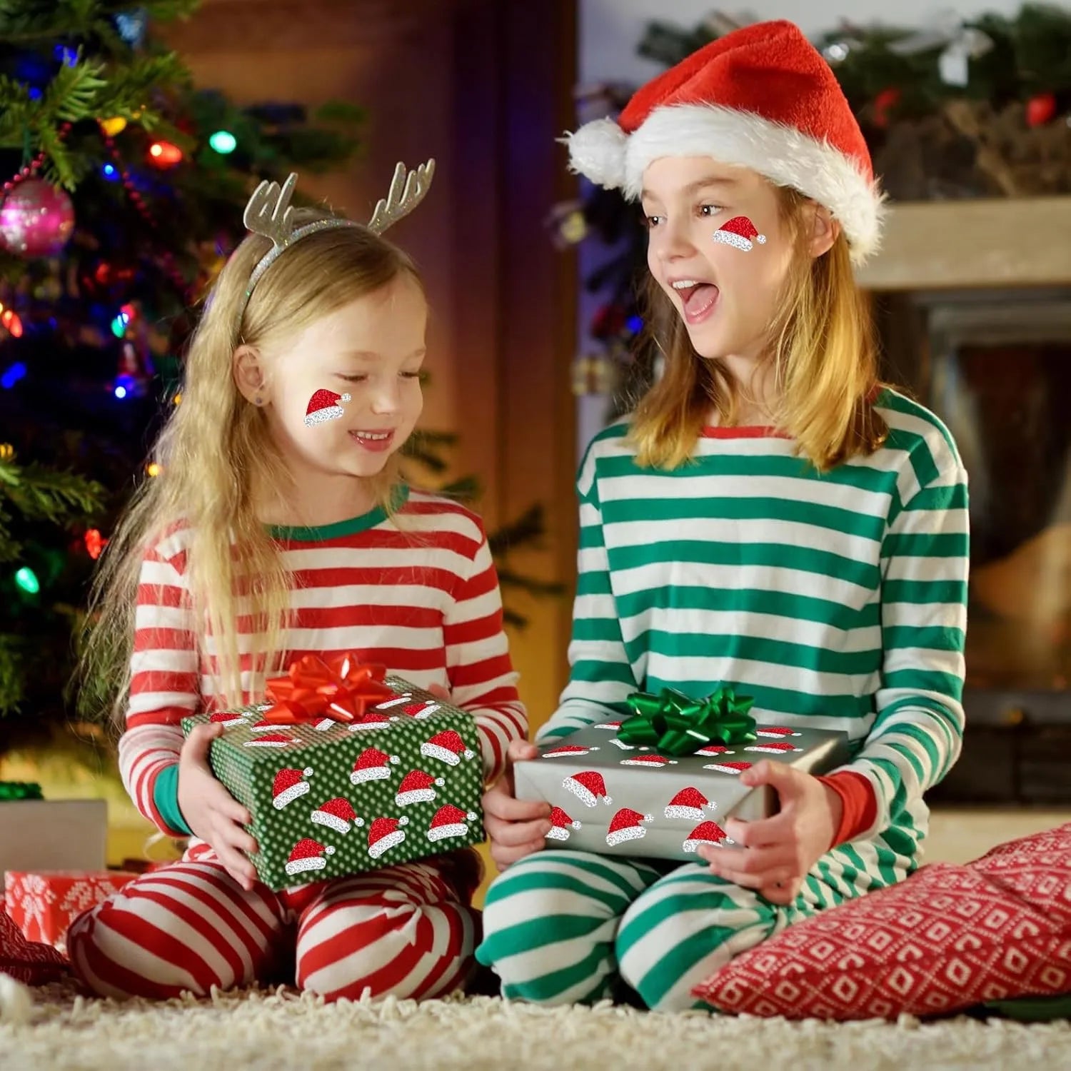 500Pcs Christmas Hat Stickers Roll | Laser Red Santa Hat Seal Stickers for Envelopes a close-up view